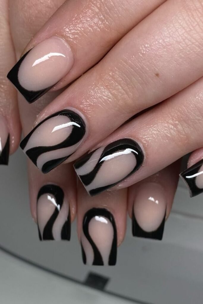 Black and Nude Swirl Nails