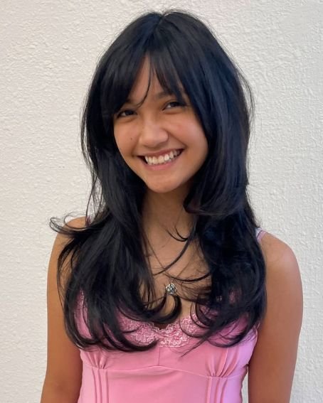 Long Layered Butterfly Cut with Wispy Bangs