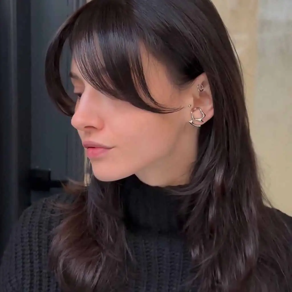 Medium Layered Cut With Curtain Bangs