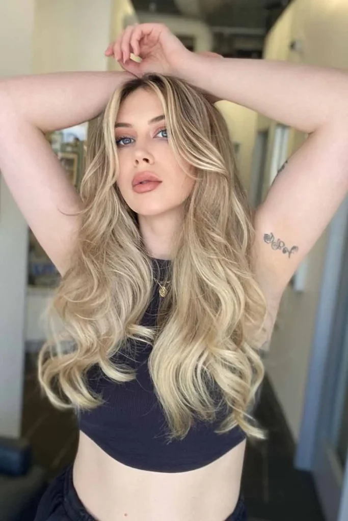 Soft Blonde Waves With Face Framing Layers