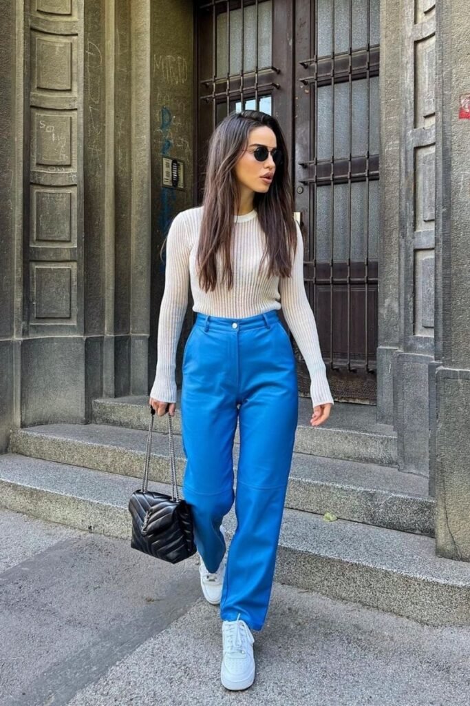blue pants with a simple white ribbed top