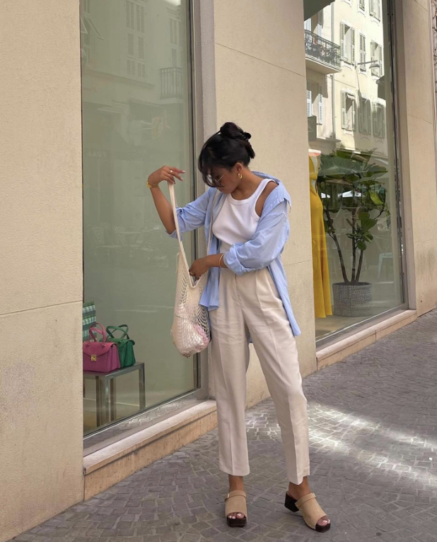 light blue shirt and cream pants