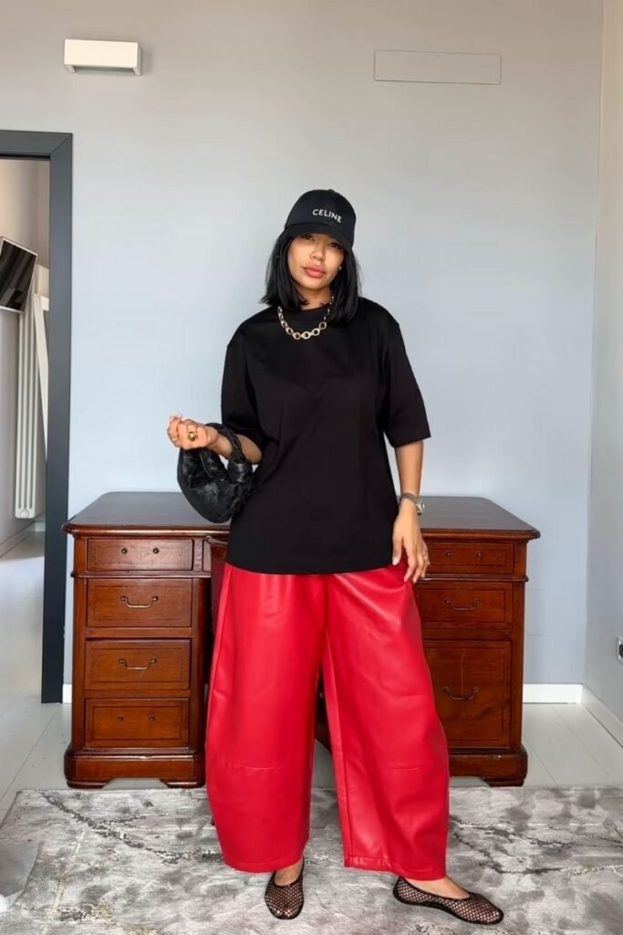 red pants with a black oversized tee