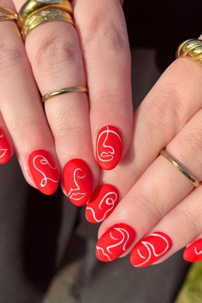 Artistic Face Red Nails