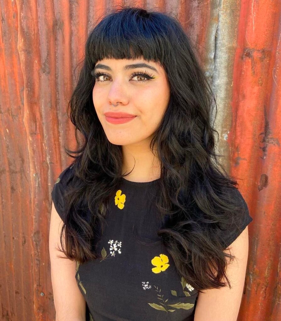 Blunt Bangs Hairstyle With Layers
