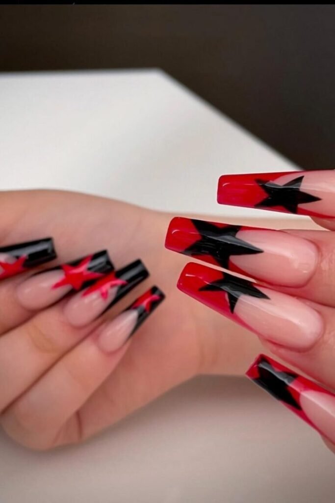 Dramatic Black and Red Star Nails