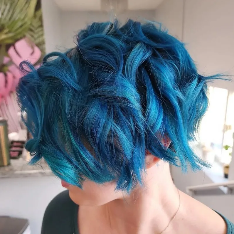 Edgy Long Curly Pixie Cut For Round Face