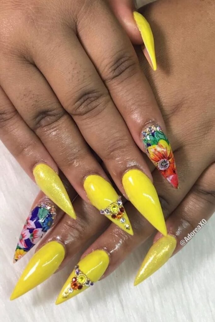 Floral and Rhinestone Accents on Yellow Stiletto Nails