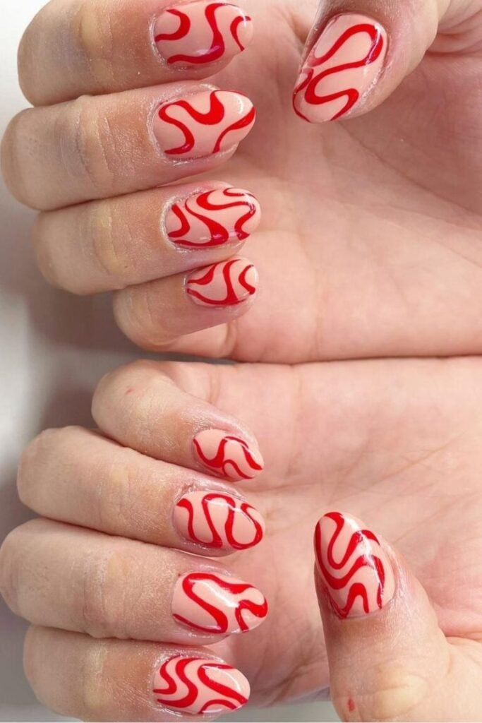 Groovy Red Swirl Nails