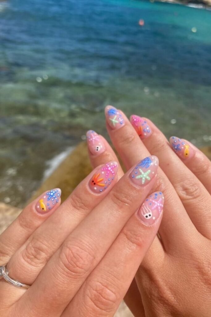 Oceanic Playful Seashell Nails