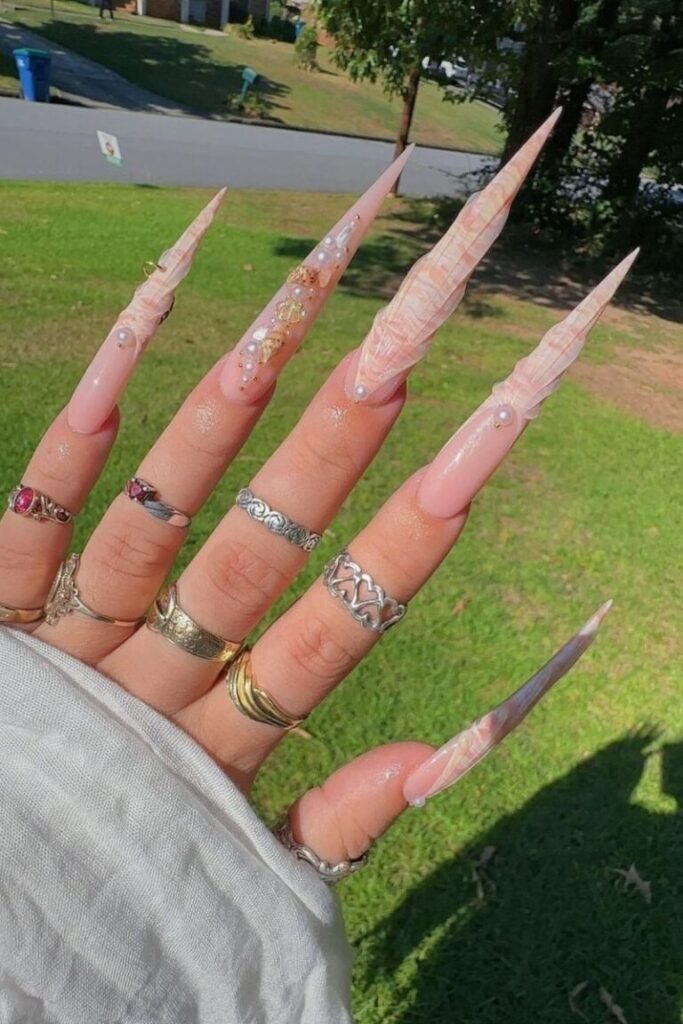 Striking Pink and Gold Shell Nails