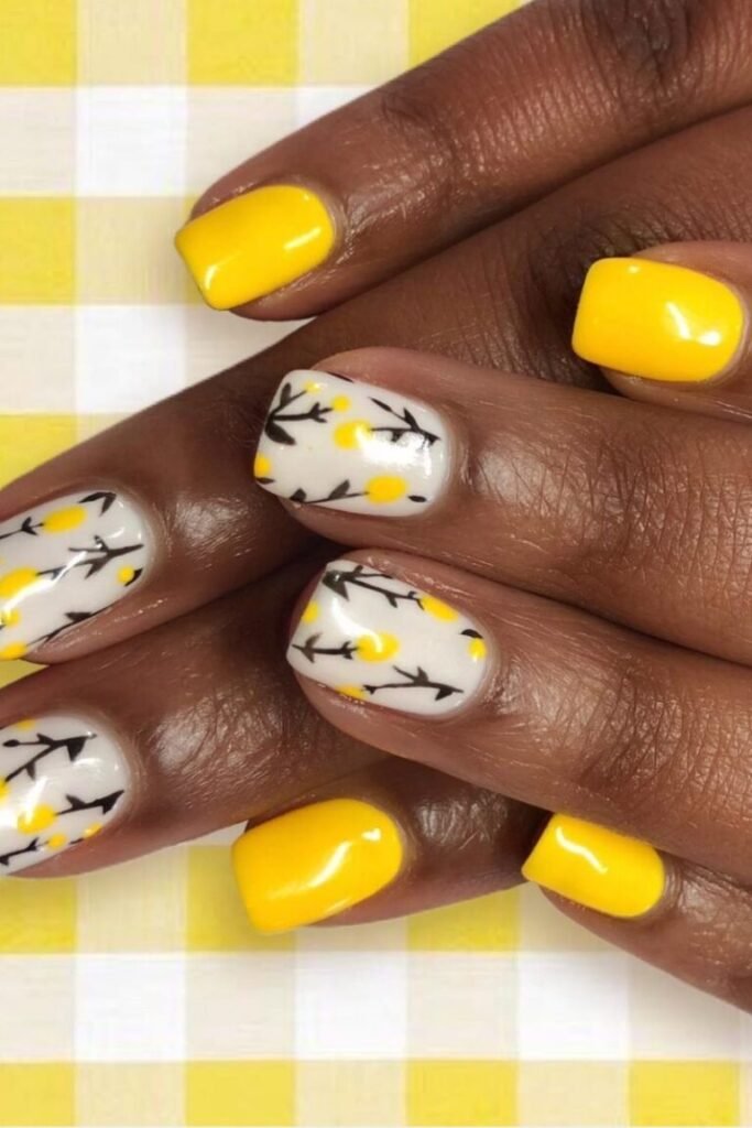 Yellow Floral Accents on Short Square Nails