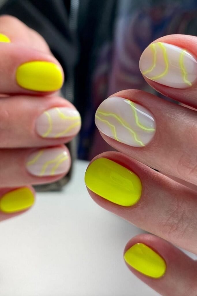 Yellow Neon and Nude Short Nail Swirls