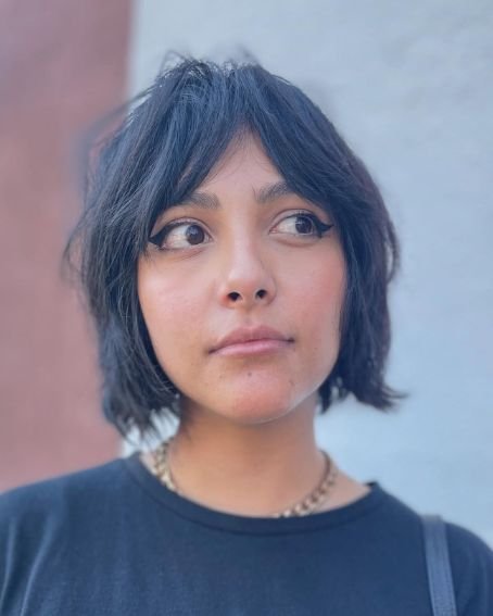 Cool Choppy Bob Haircut with Bardot Bangs