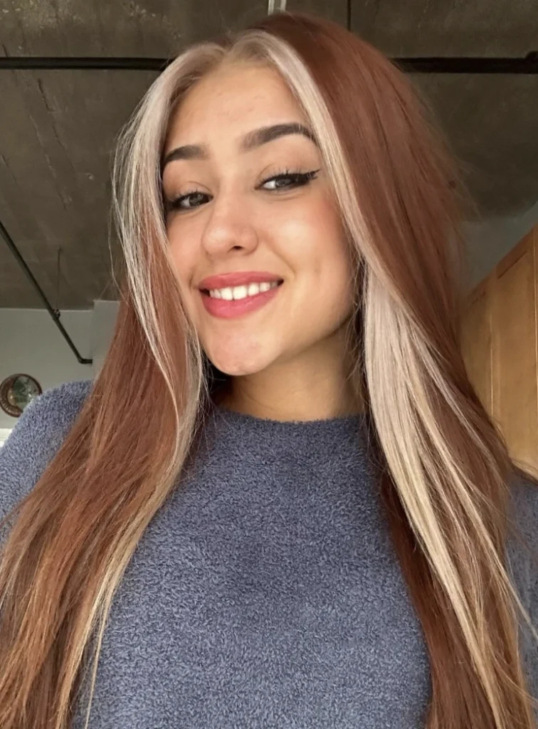 Long Fall Blonde Hair with Bold Chestnut Highlights and Face Framing Strands
