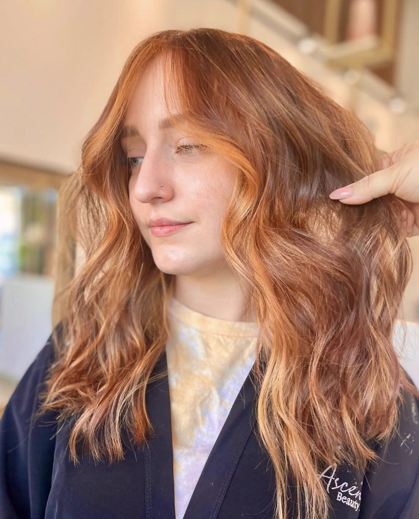 Long Wavy Hair with Subtle Highlights and Fall Blonde Hair Color