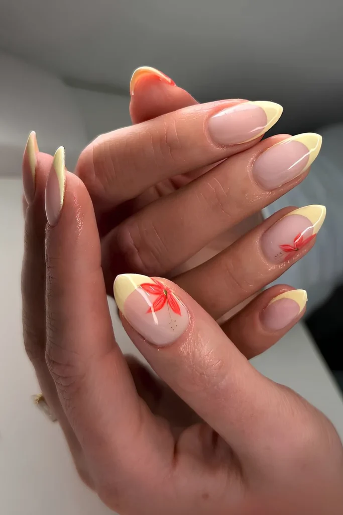 Pale yellow French mani with red flowers.jpg