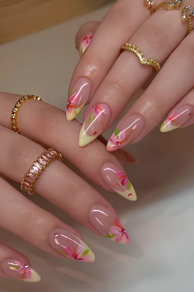 Pastel yellow French mani with pink flowers.jpg