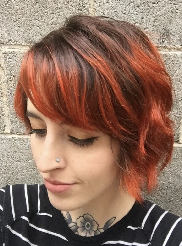 Textured Bob with Vibrant Copper Highlights for Short Hair