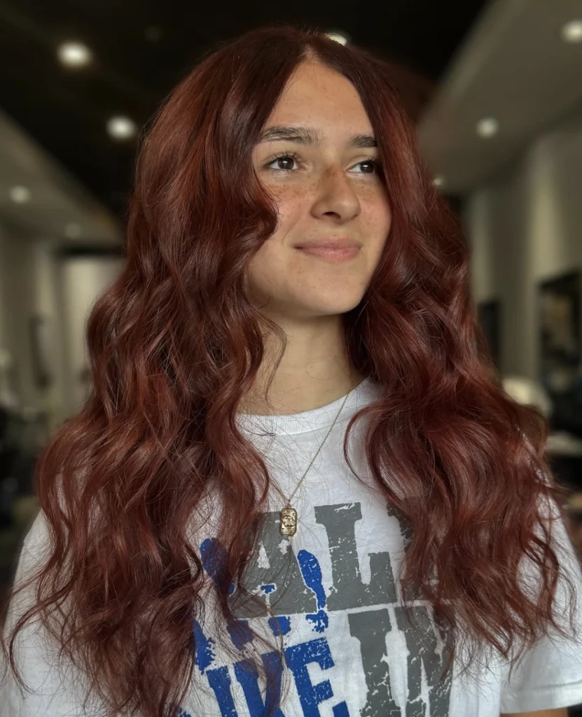 Wavy Locks for Medium Length Autumn Brown Hair with Subtle Highlights