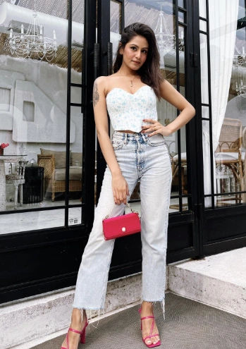 White Floral Corset Top High Waisted Distressed Jeans Pink Strappy Heels Red Mini Handbag