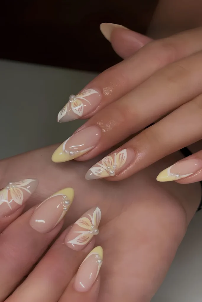 Yellow French mani with pearls and flowers.jpg
