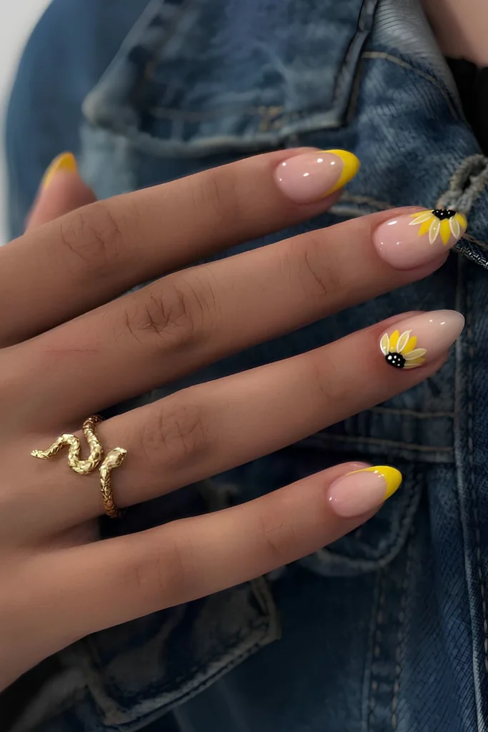 Yellow French nails with sunflowers.jpg