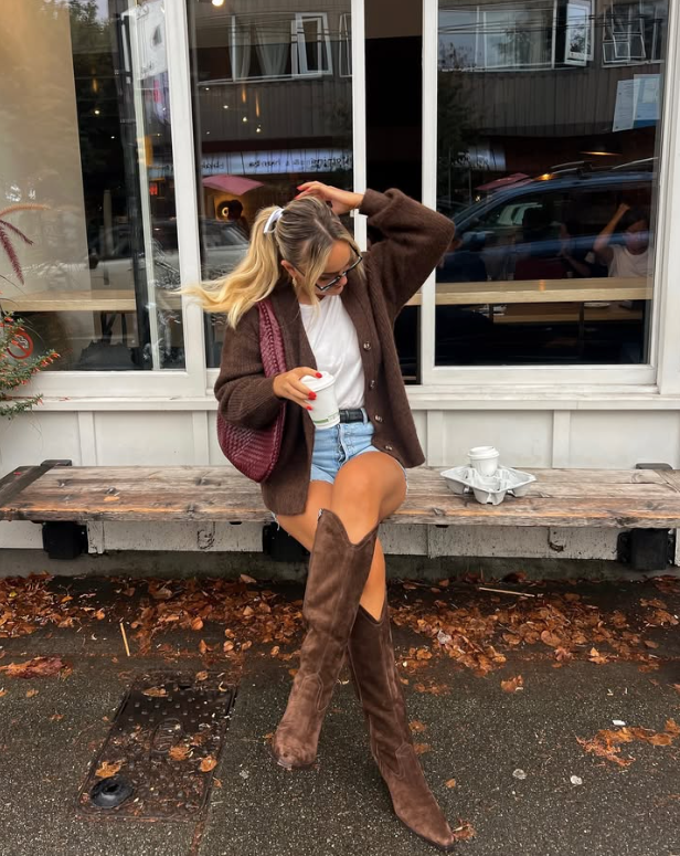 brown cardigan white shirt denim shorts and tall brown boots