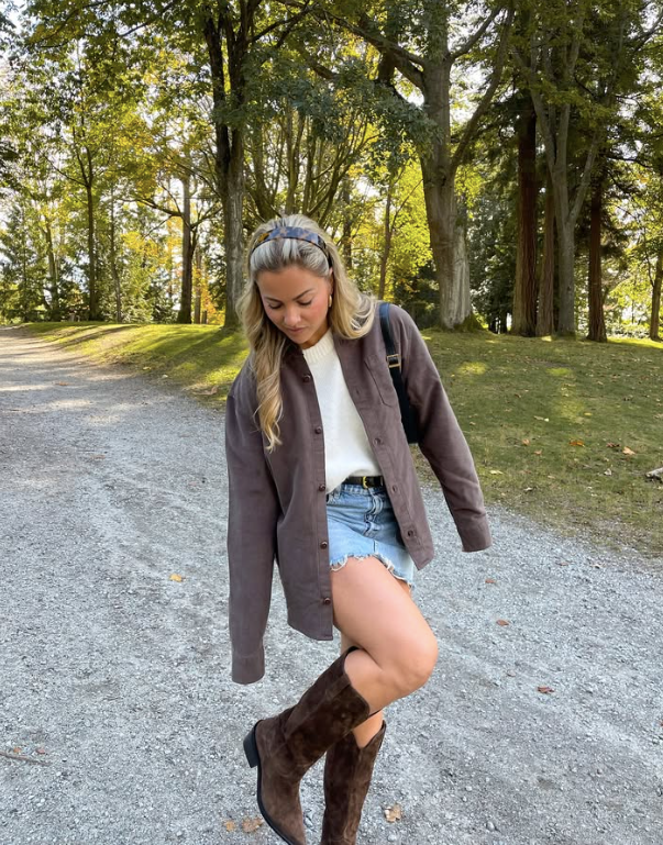 brown jacket white sweater denim shorts and brown knee high boots