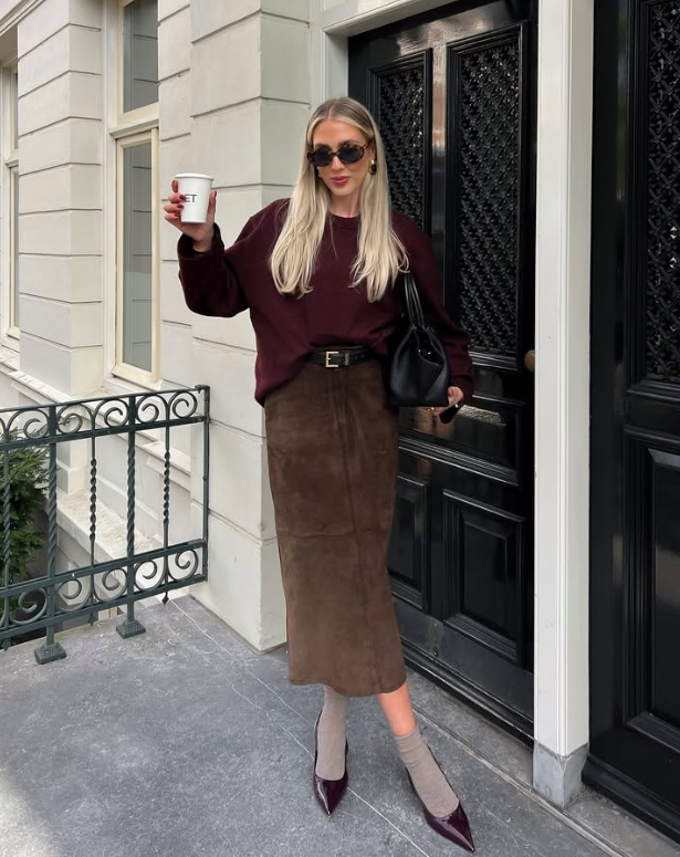 burgundy sweater a brown suede skirt gray socks and pointed burgundy heels