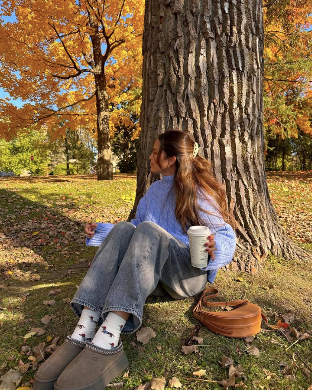 light blue sweater and jeans