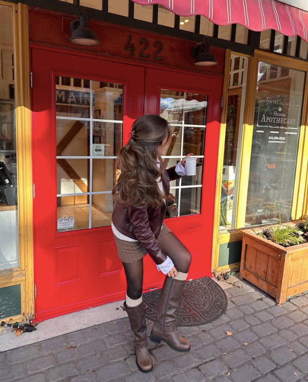 maroon jacket skirt and tall brown boots