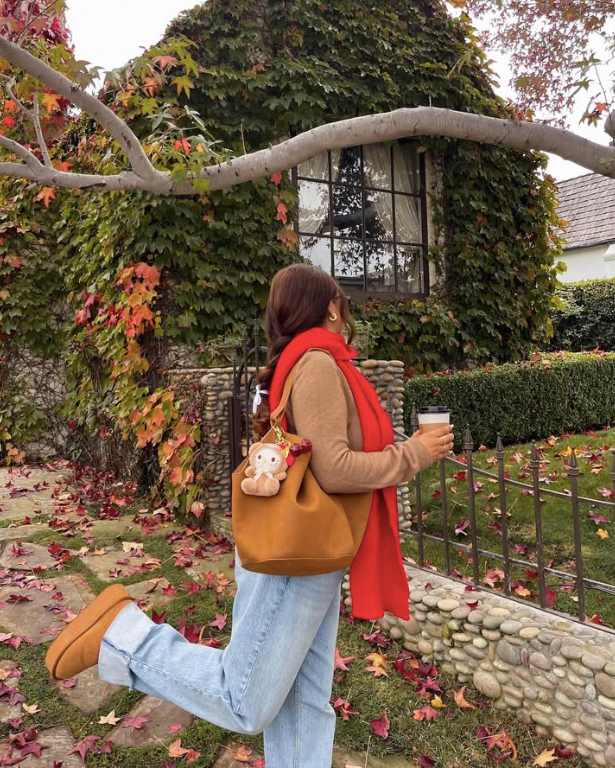 red scarf and a brown sweater