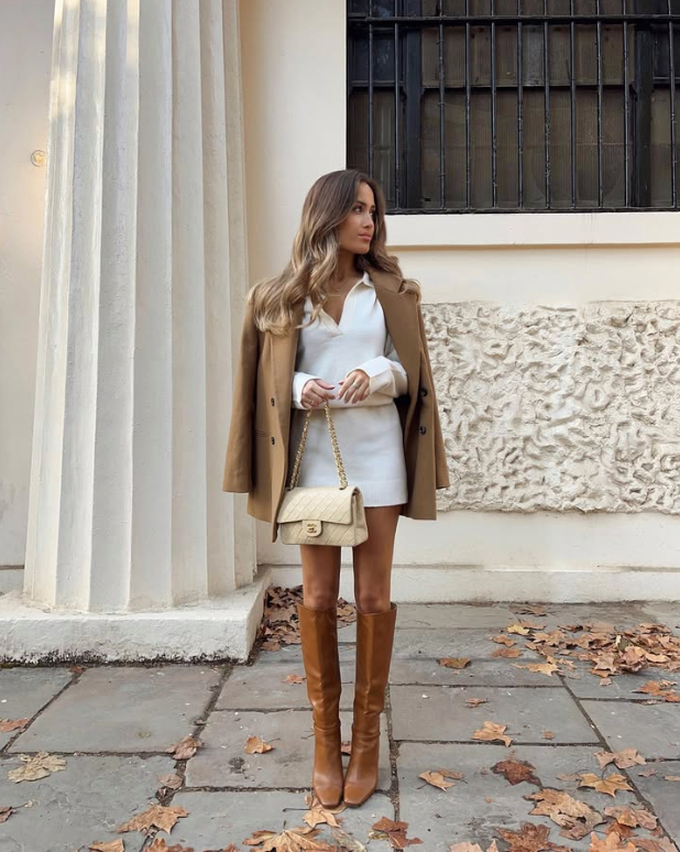 white dress paired with a tan coat