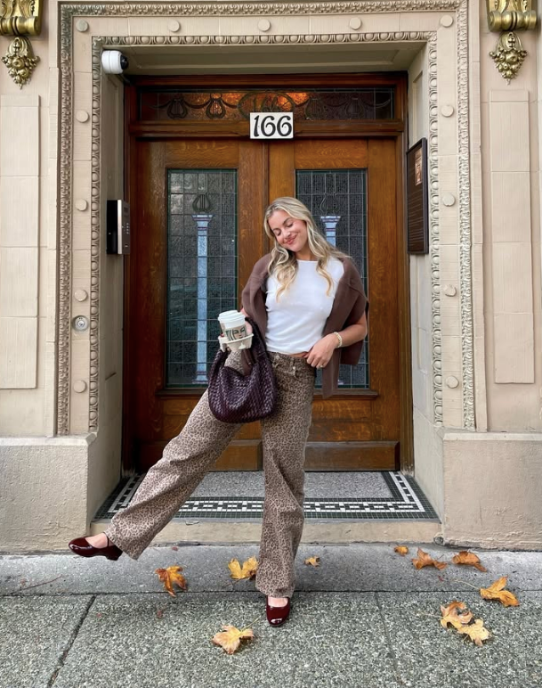 white top patterned pants and burgundy shoes