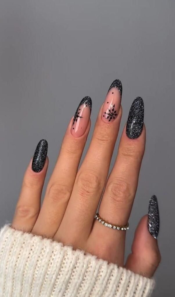 Black Glitter and Snowflake Almond Nails