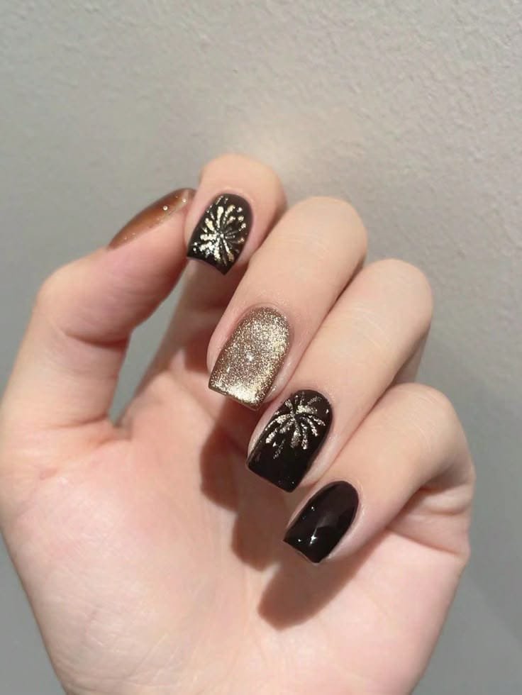 Black and Gold Firework Nails 1