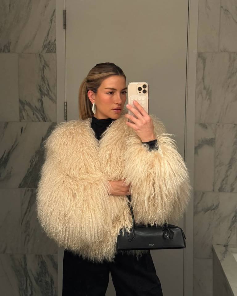 Cream Mongolian Shearling Jacket and Sleek Black Trousers