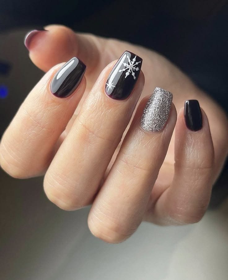 Glossy Black Nails With a Silver Accent