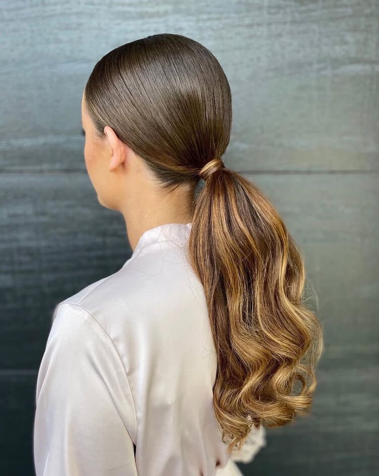 Low Ponytail with Curls