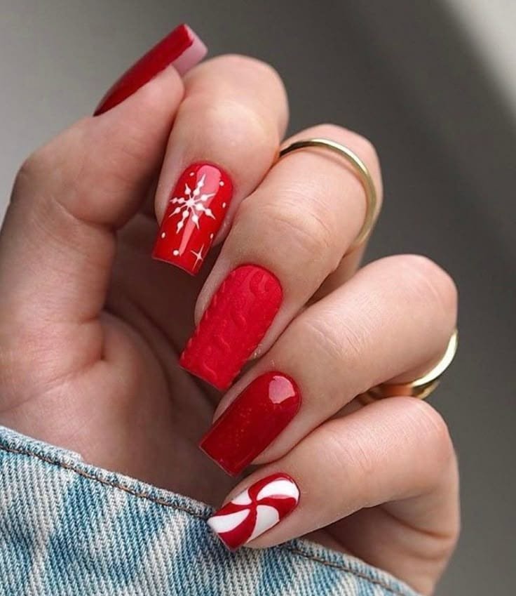 Red Nails With Snowflakes and Candy Swirls