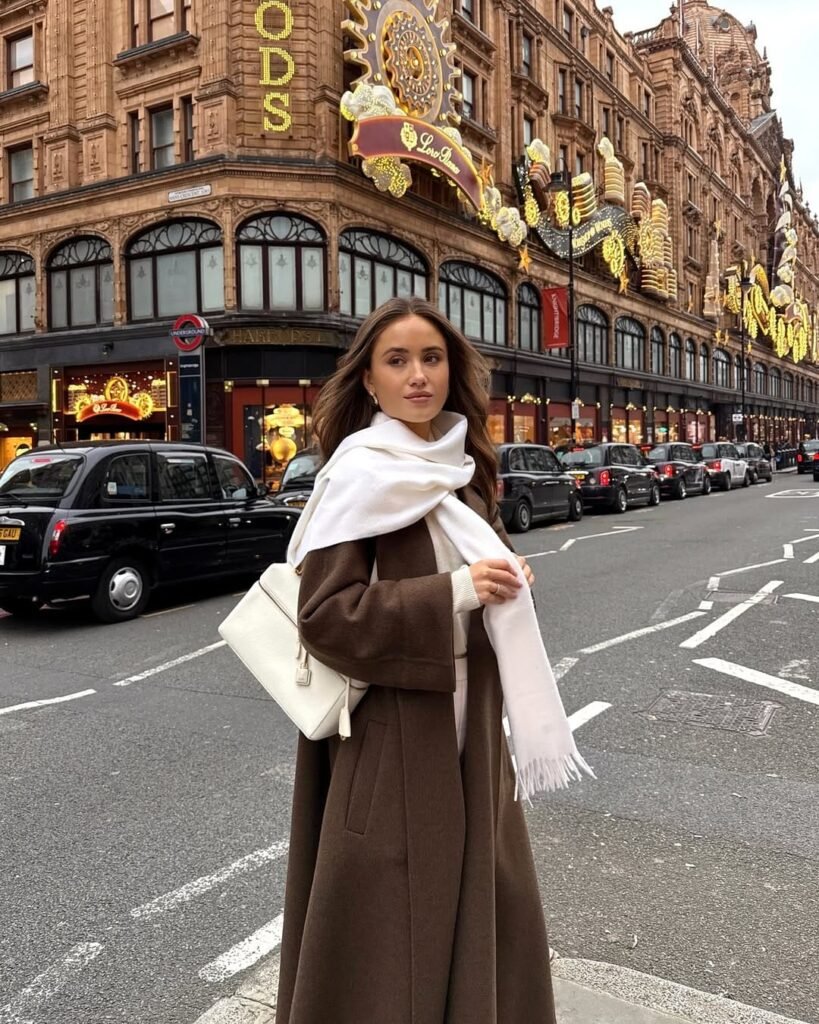 Rich Brown Wool Coat with Crisp White Scarf