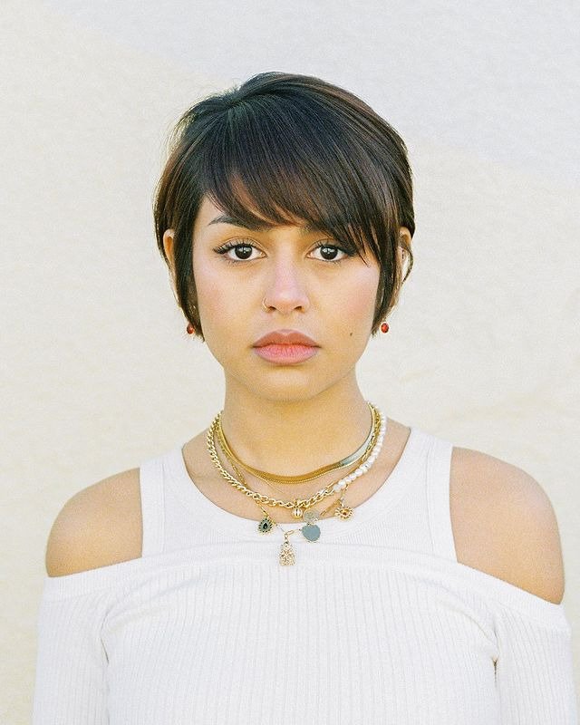 Sleek Bixie Cut with Side Swept Bangs