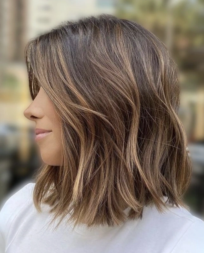 Subtle Caramel Highlights on a Brunette Bob