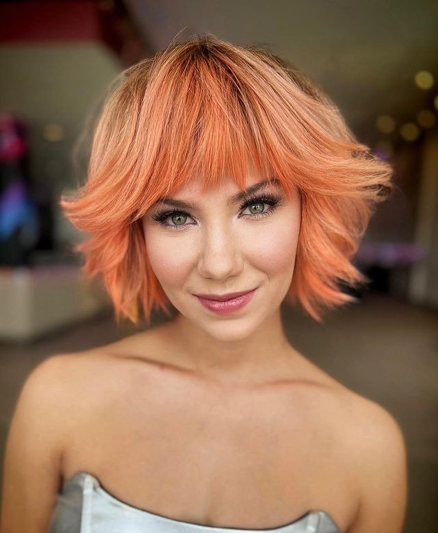 Voluminous Bixie Cut with Bold Color