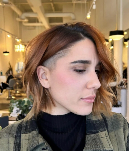 Wavy Auburn Bob with a Shaved Side