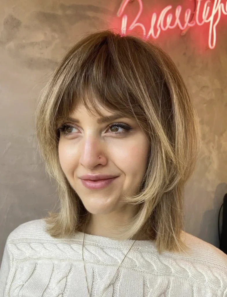 Layered Blonde Bob with Wispy Bangs
