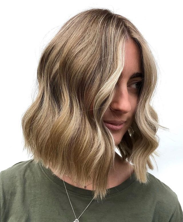 Wavy Lob with Face Framing Highlights